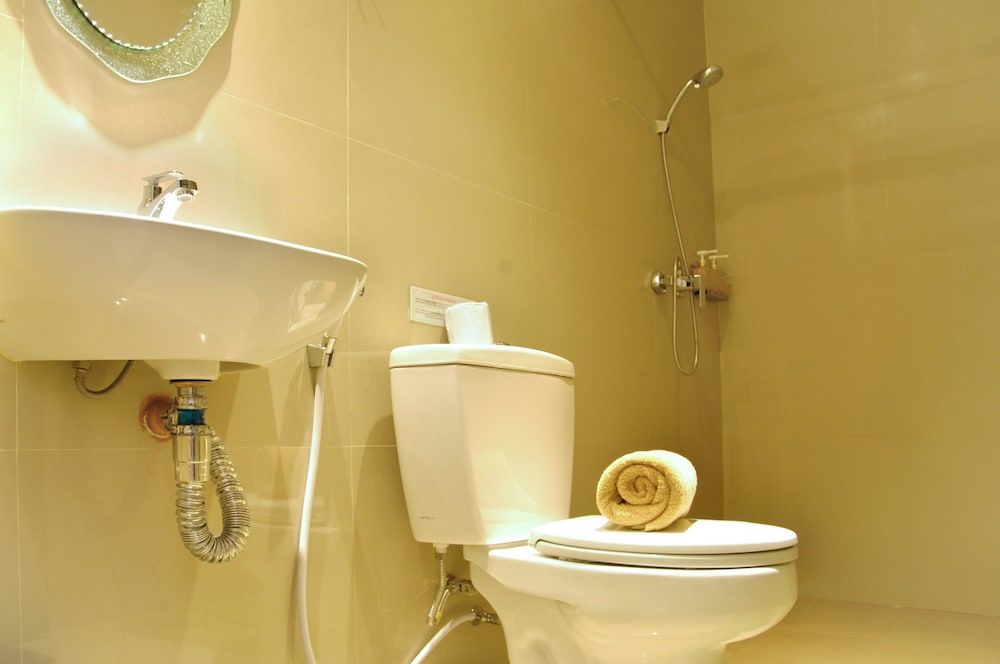 Kuta Sari House Deluxe Room 4