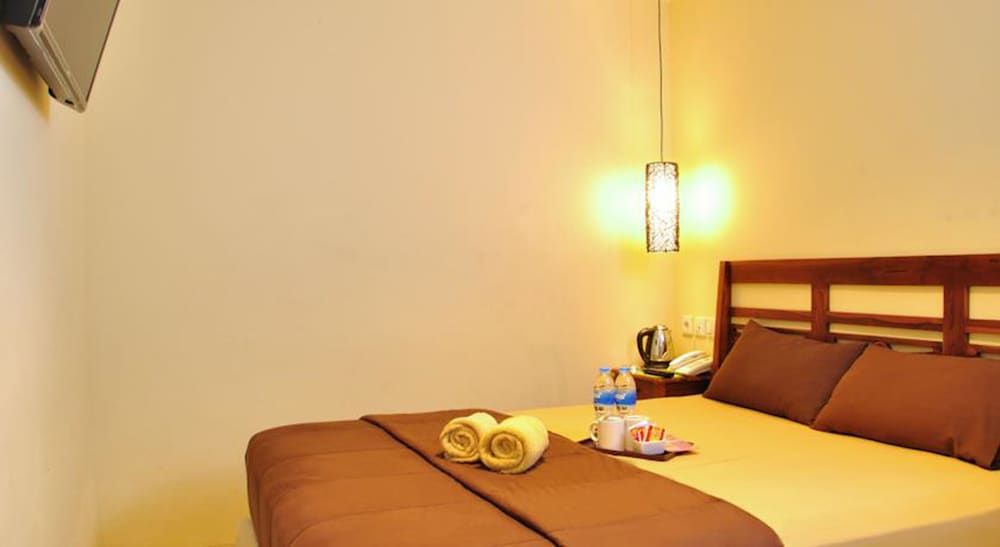 Kuta Sari House Deluxe Room 3