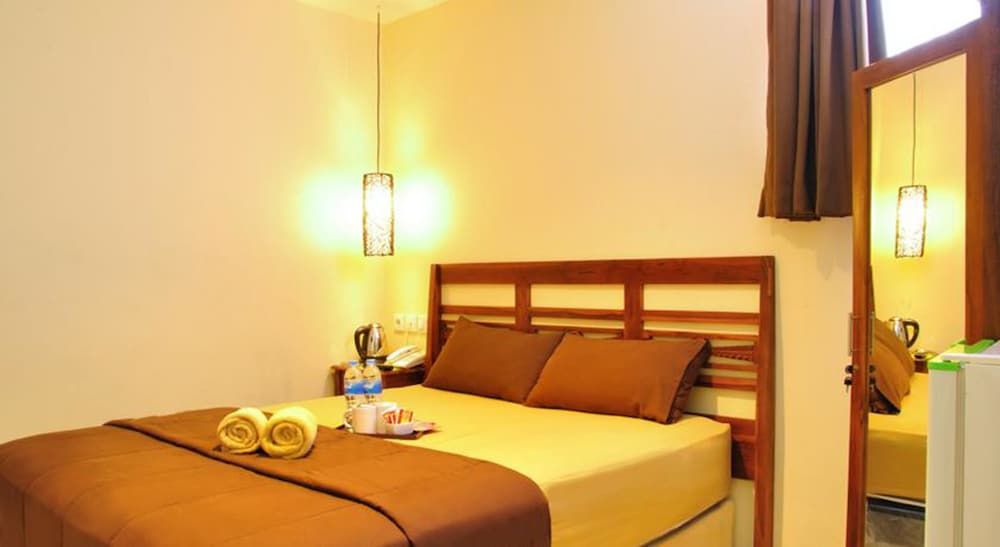 Kuta Sari House Deluxe Room 2