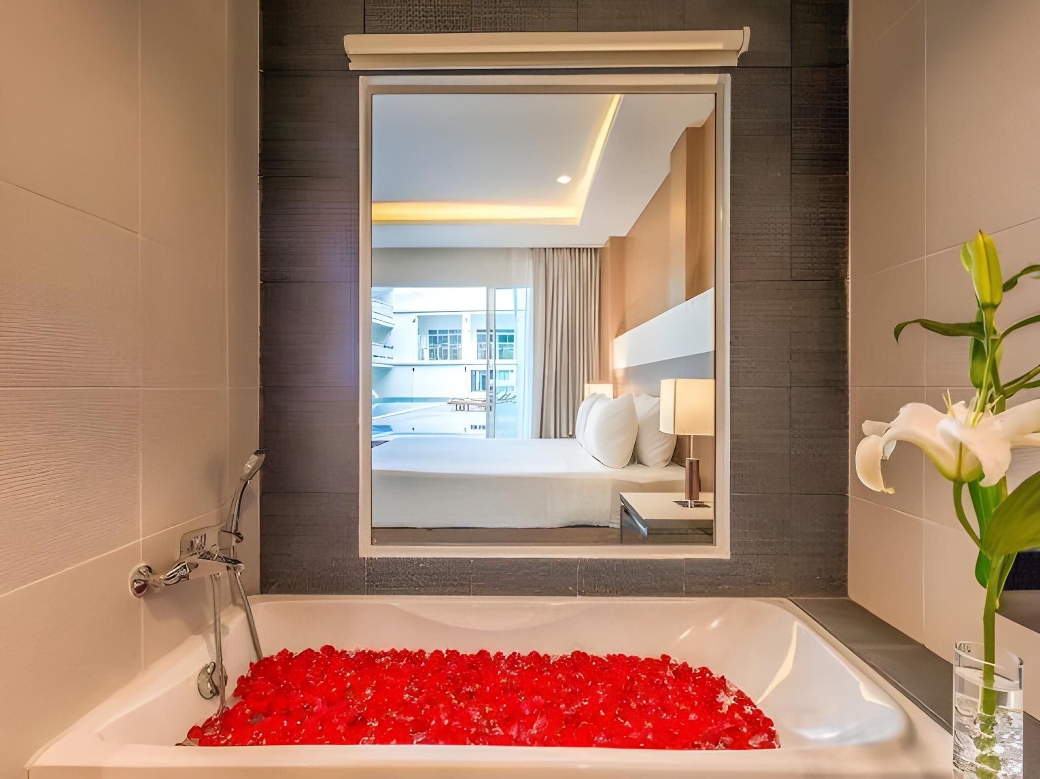 deluxe pool view with bathtub & balcony