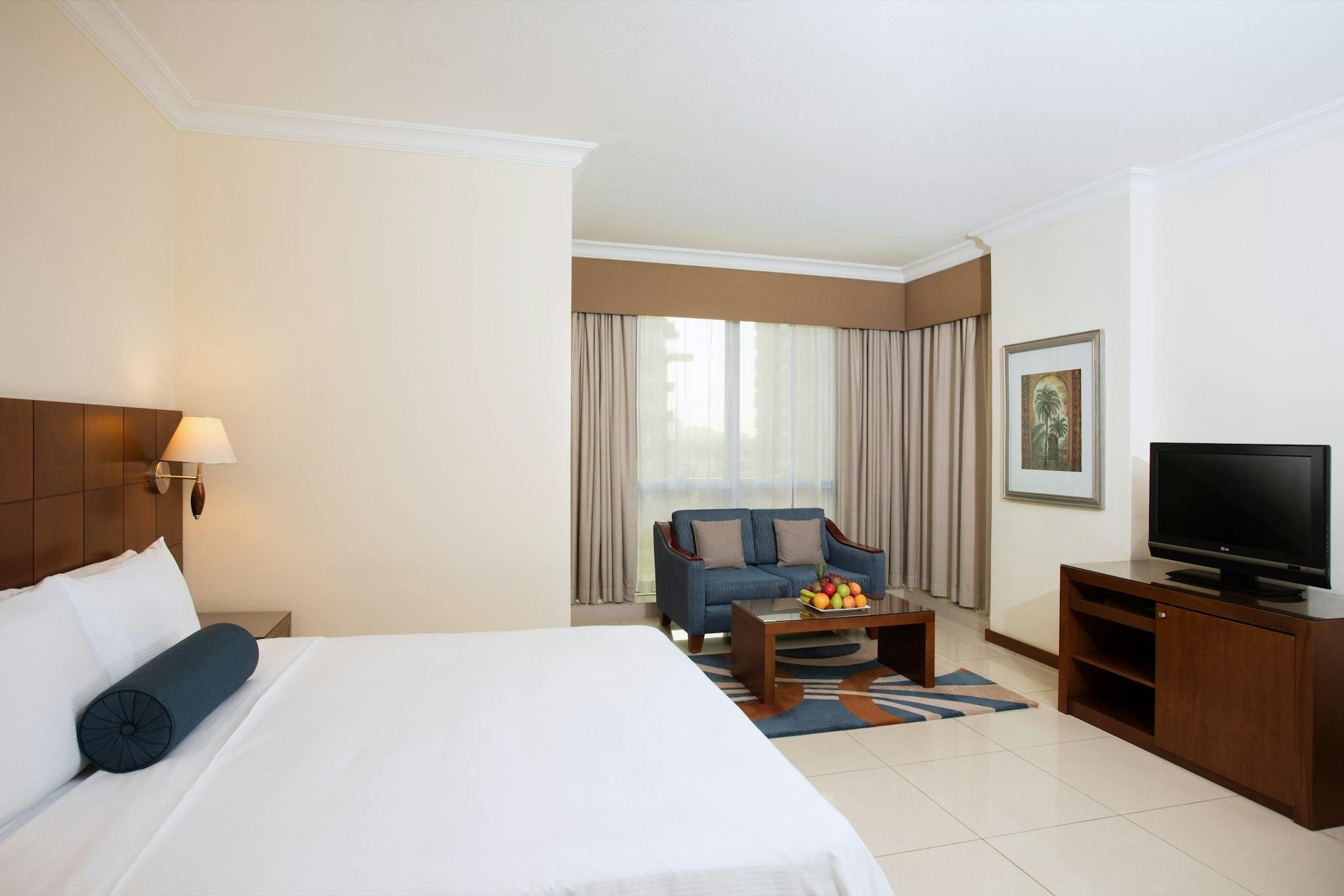 Al Rawda Arjaan by Rotana Guest Room with King Bed