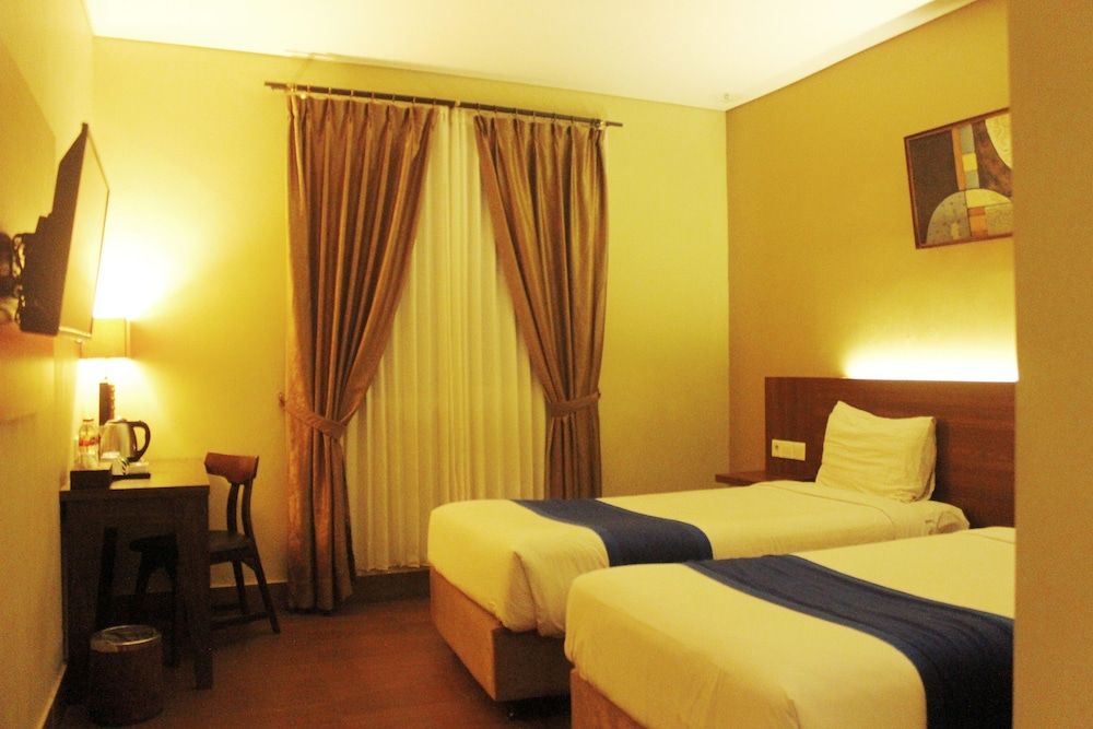 Hotel Dafam Cilacap Deluxe Room