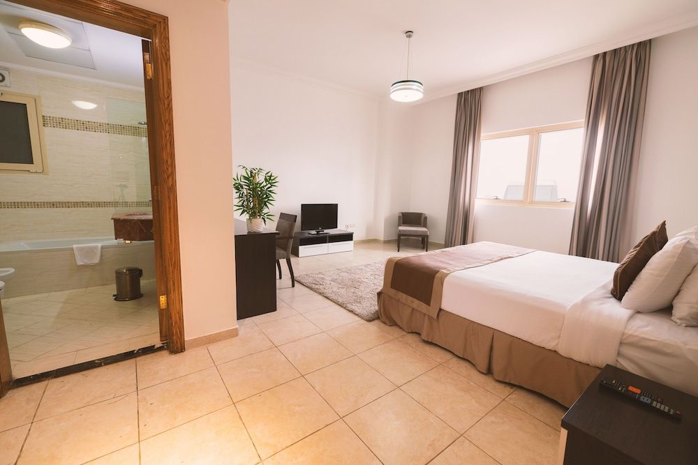 undefined Magnum Hotel & Suites West Bay 3