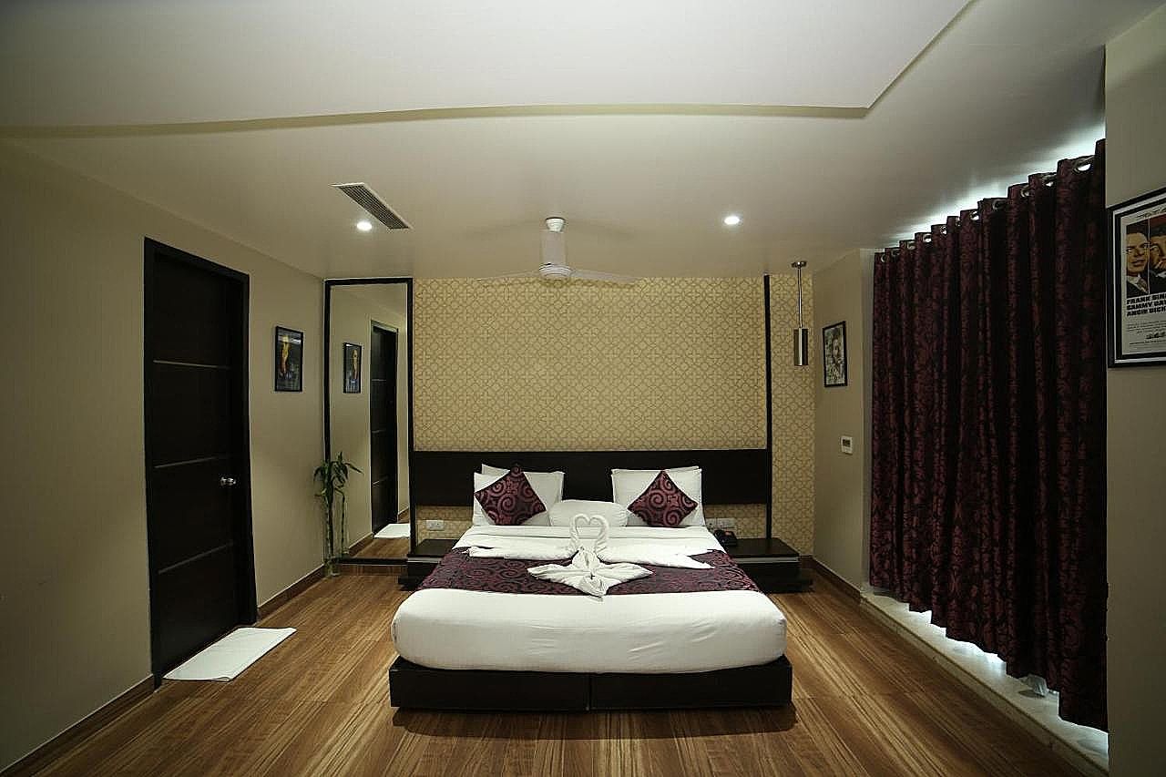 WoodApple Residency Deluxe Double Room 6