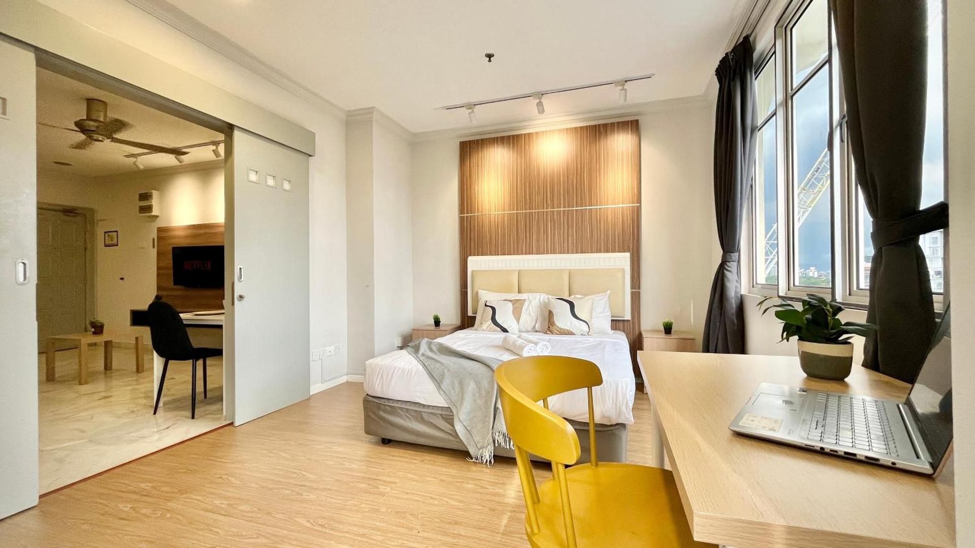 One-Bedroom Apartment with Balcony and City View