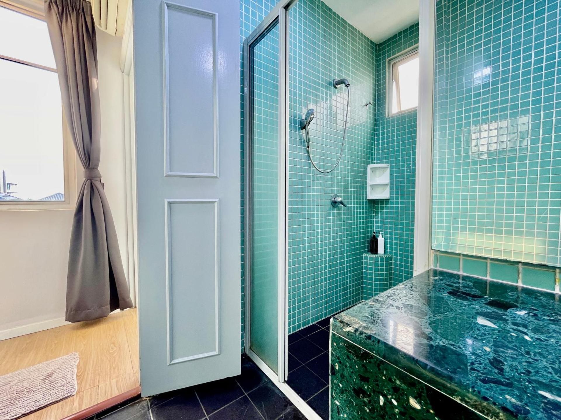 One-Bedroom Apartment with Balcony and City View