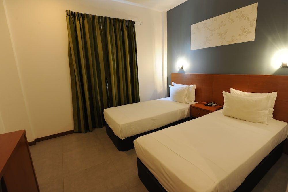 Inn Luanda Economy Triple Room