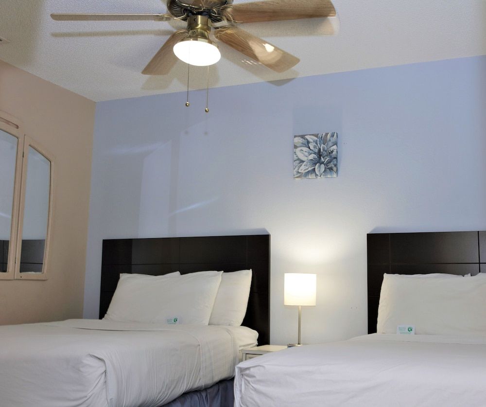 Victoria Palms Inn & Suites Deluxe Suite, 2 Double Beds with Sofa Bed 2