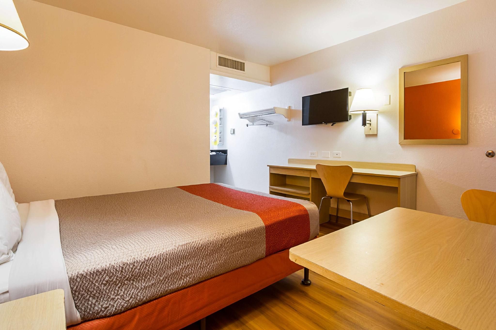 1 Queen Bed  Mini Fridge