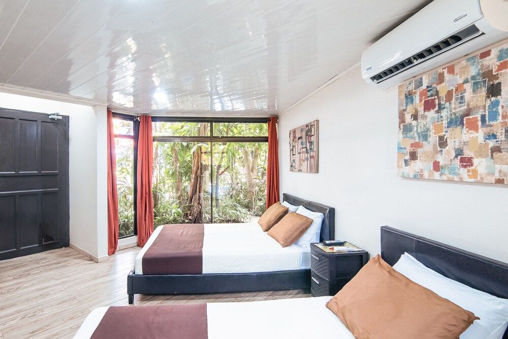 Jaco Lodge Quiet Hotel Double room, Multiple beds, garden area - Pets allowed 8