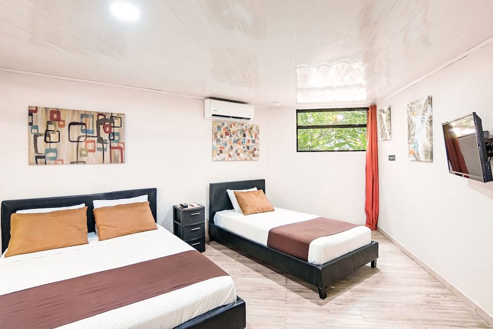 Jaco Lodge Quiet Hotel Double room, Multiple beds, garden area - Pets allowed 4