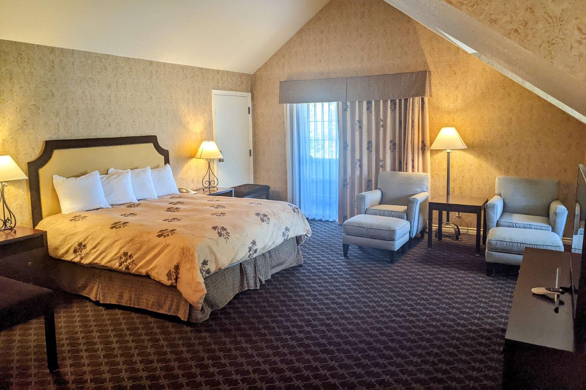 Suite - 1 King Bed, Nonsmoking, Jetted Tub, Balcony, Armchair, Love Seat