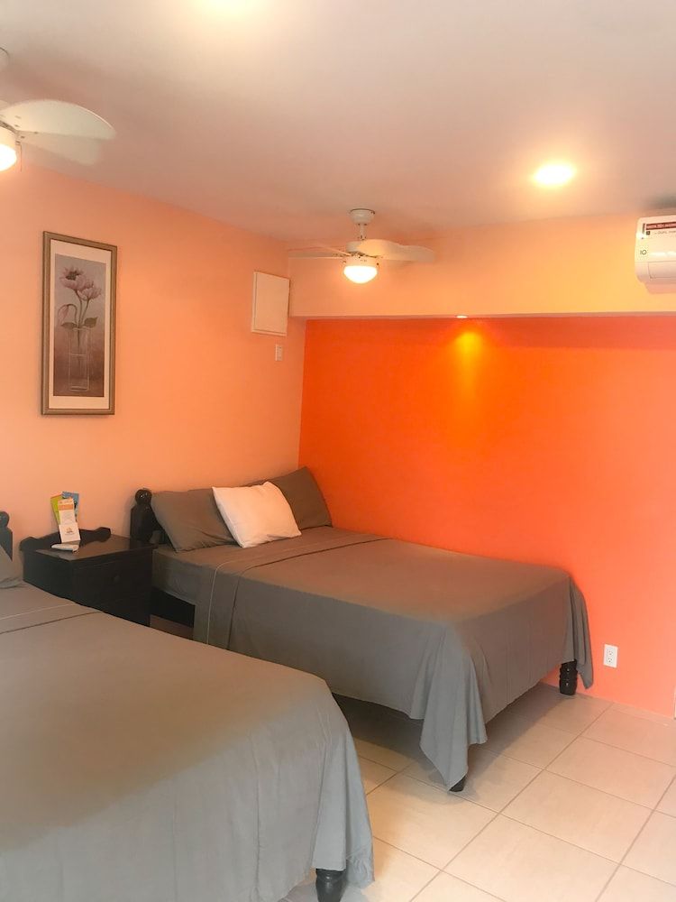 Tropical Paradise Hotel Traditional Room, 2 Double Beds, Partial Sea View 3