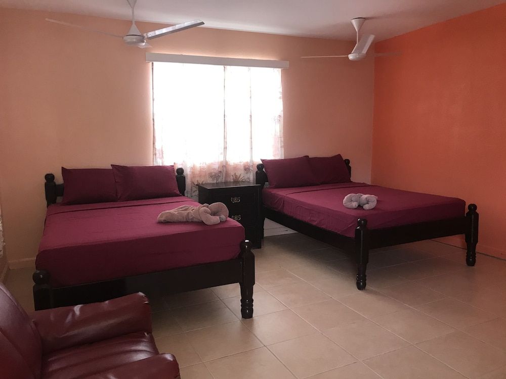 Tropical Paradise Hotel Traditional Room, 2 Double Beds, Partial Sea View 4