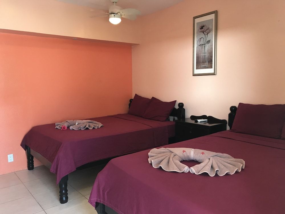 Tropical Paradise Hotel Traditional Room, 2 Double Beds, Partial Sea View 6