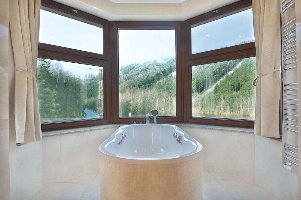 Retro Riverside Wellness Resort Deluxe Suite, Balcony, River View 9
