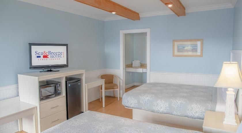 Sea And Breeze Hotel And Condo Queen Room with Two Queen Beds 12