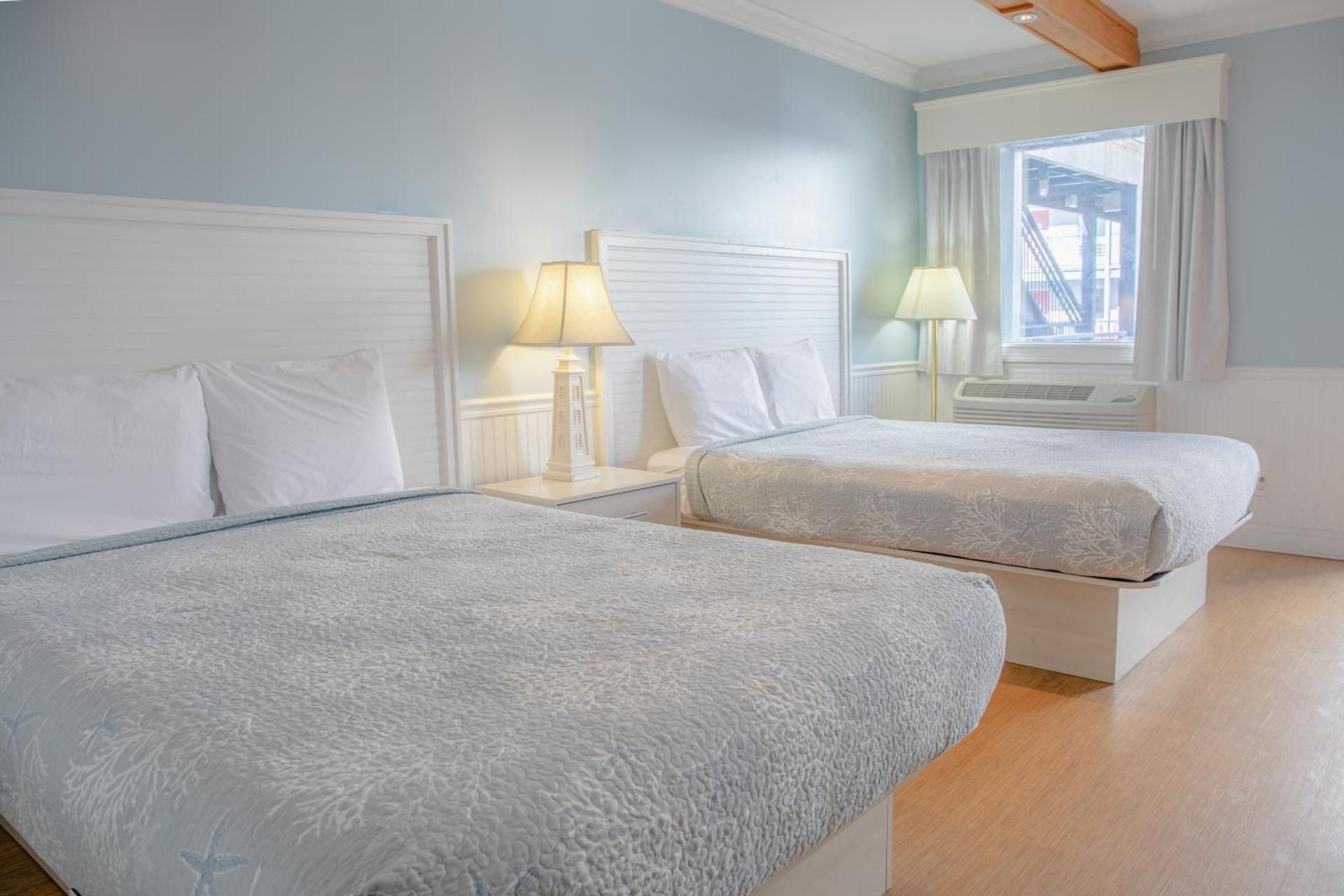 Sea And Breeze Hotel And Condo Queen Room with Two Queen Beds 3