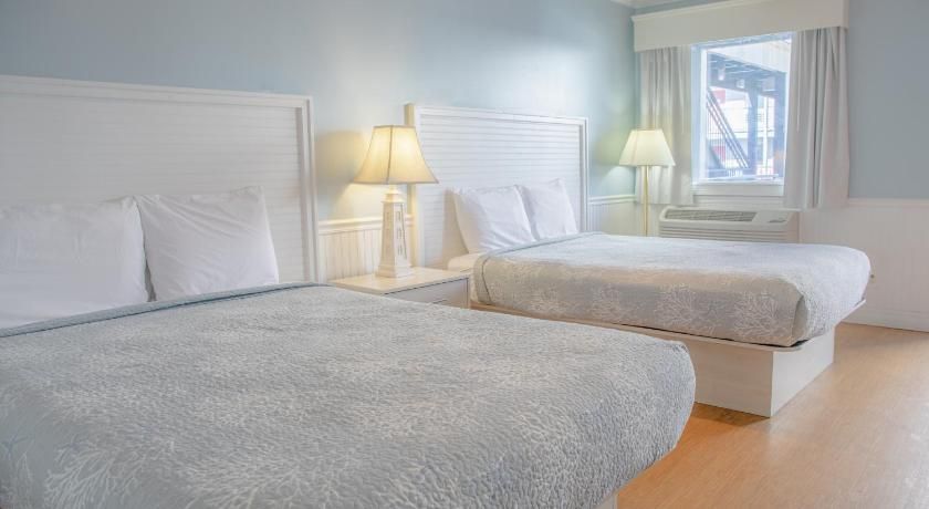 Sea And Breeze Hotel And Condo Queen Room with Two Queen Beds 2