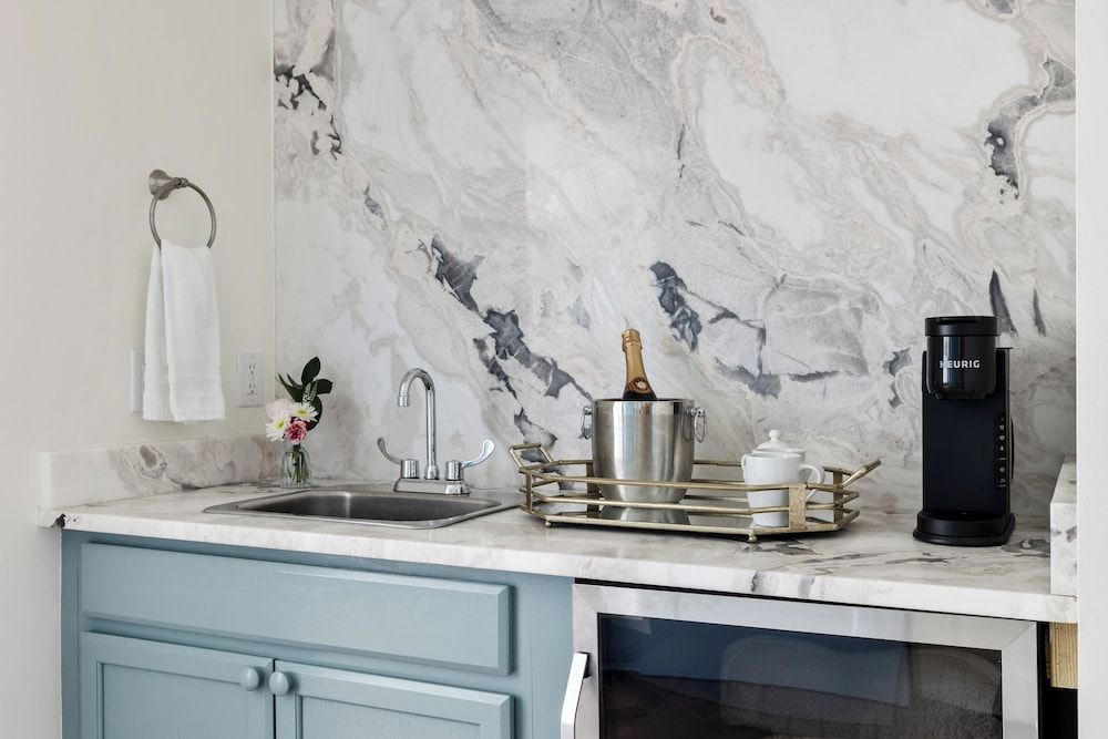 Regatta Inn Folly Beach Deluxe Room, 1 King Bed, River View, Garden Area 6