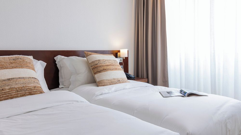 Albergaria Quim Barreiros Quarto Twin Vista Terra 6