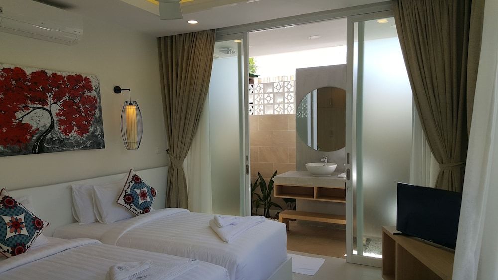 Sahaa Beach Resort Deluxe Twin Bungalow Garden View 6