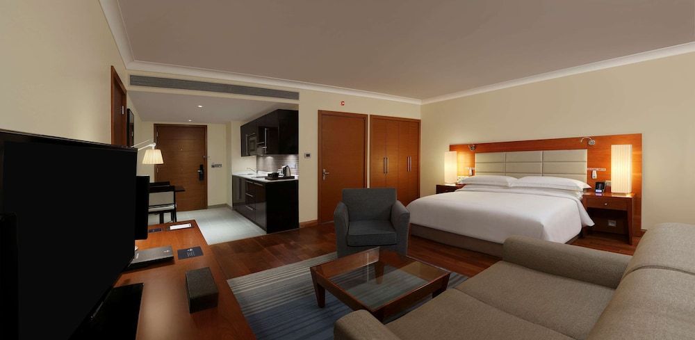 Hilton Bangalore Embassy GolfLinks King Hilton Guestroom with Sofa cum Bed, Bathtub,15% disc on F&B,Spa 11