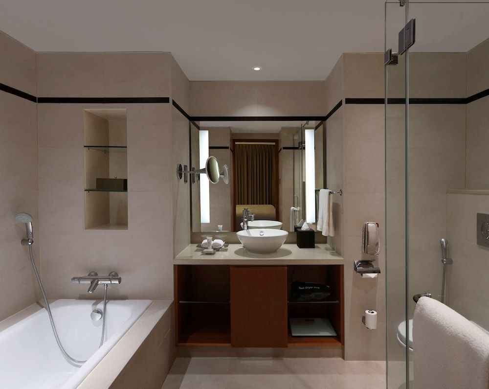Hilton Bangalore Embassy GolfLinks King Hilton Guestroom with Sofa cum Bed, Bathtub,15% disc on F&B,Spa 12