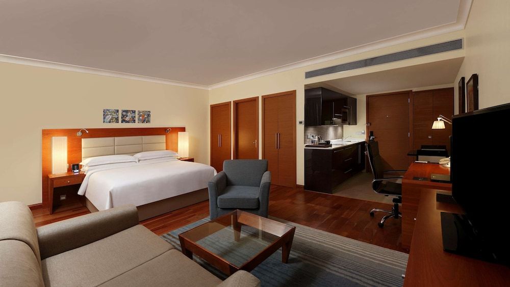Hilton Bangalore Embassy GolfLinks King Hilton Guestroom with Sofa cum Bed, Bathtub,15% disc on F&B,Spa 10