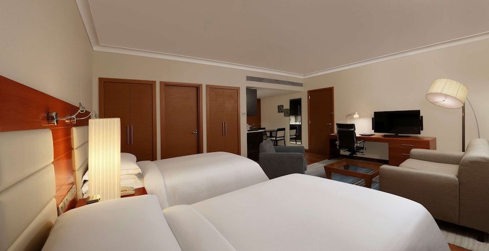 Hilton Bangalore Embassy GolfLinks King Hilton Guestroom with Sofa cum Bed, Bathtub,15% disc on F&B,Spa