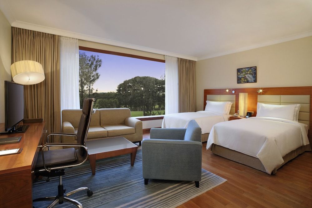 Hilton Bangalore Embassy GolfLinks King Hilton Guestroom with Sofa cum Bed, Bathtub,15% disc on F&B,Spa 5