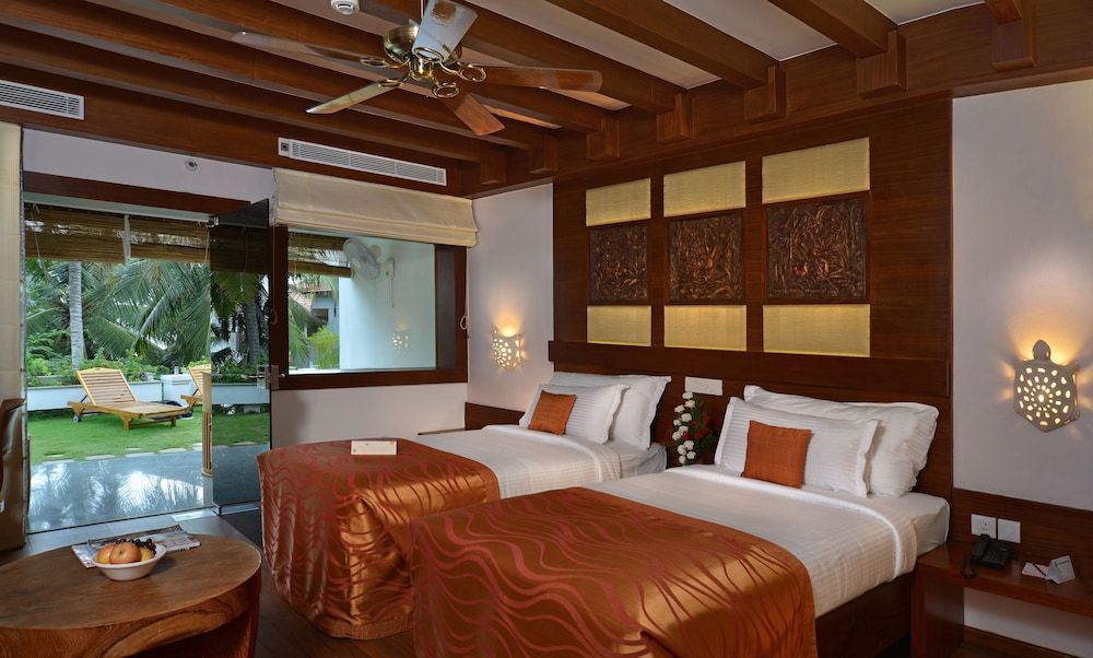 Gokulam Grand Turtle On The Beach Deluxe Room 5
