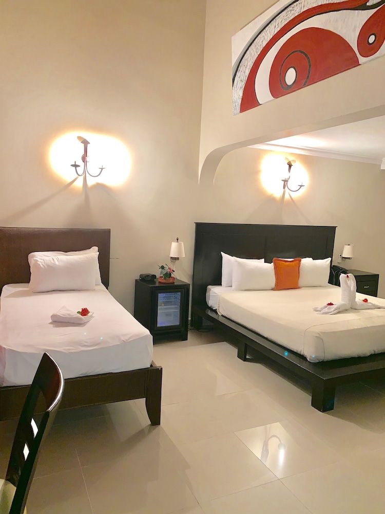 Suite Deluxe 1 Cama grande y 1 individual