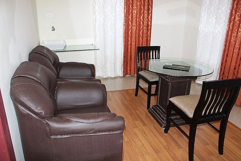 Suite With Balcony and Living Room