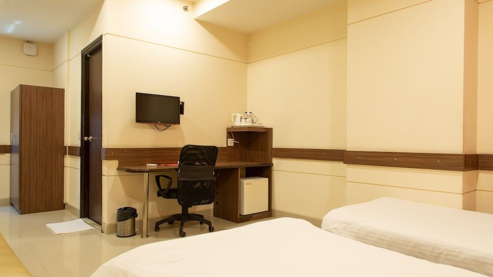Ginger Tirupur Standard Room 14