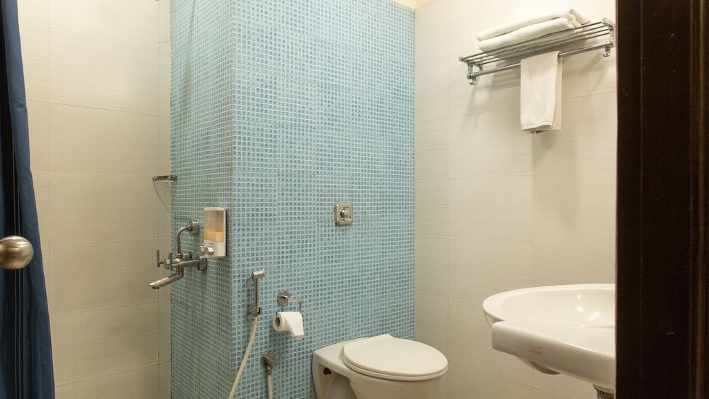 Ginger Tirupur Standard Room 12