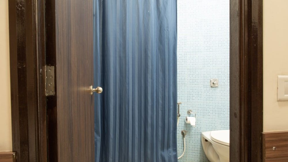 Ginger Tirupur Standard Room 7