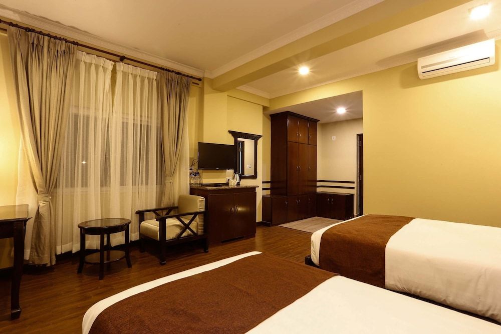 Da Yatra Courtyard Hotel & Resort Deluxe Twin Room 8