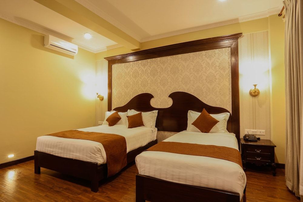 Da Yatra Courtyard Hotel & Resort Deluxe Twin Room 9