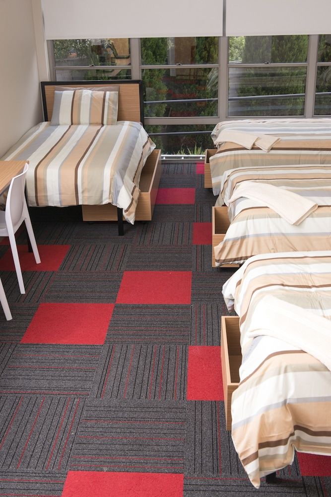 Bed in 4-Bed Male Dormitory Room with Shared Bathroom