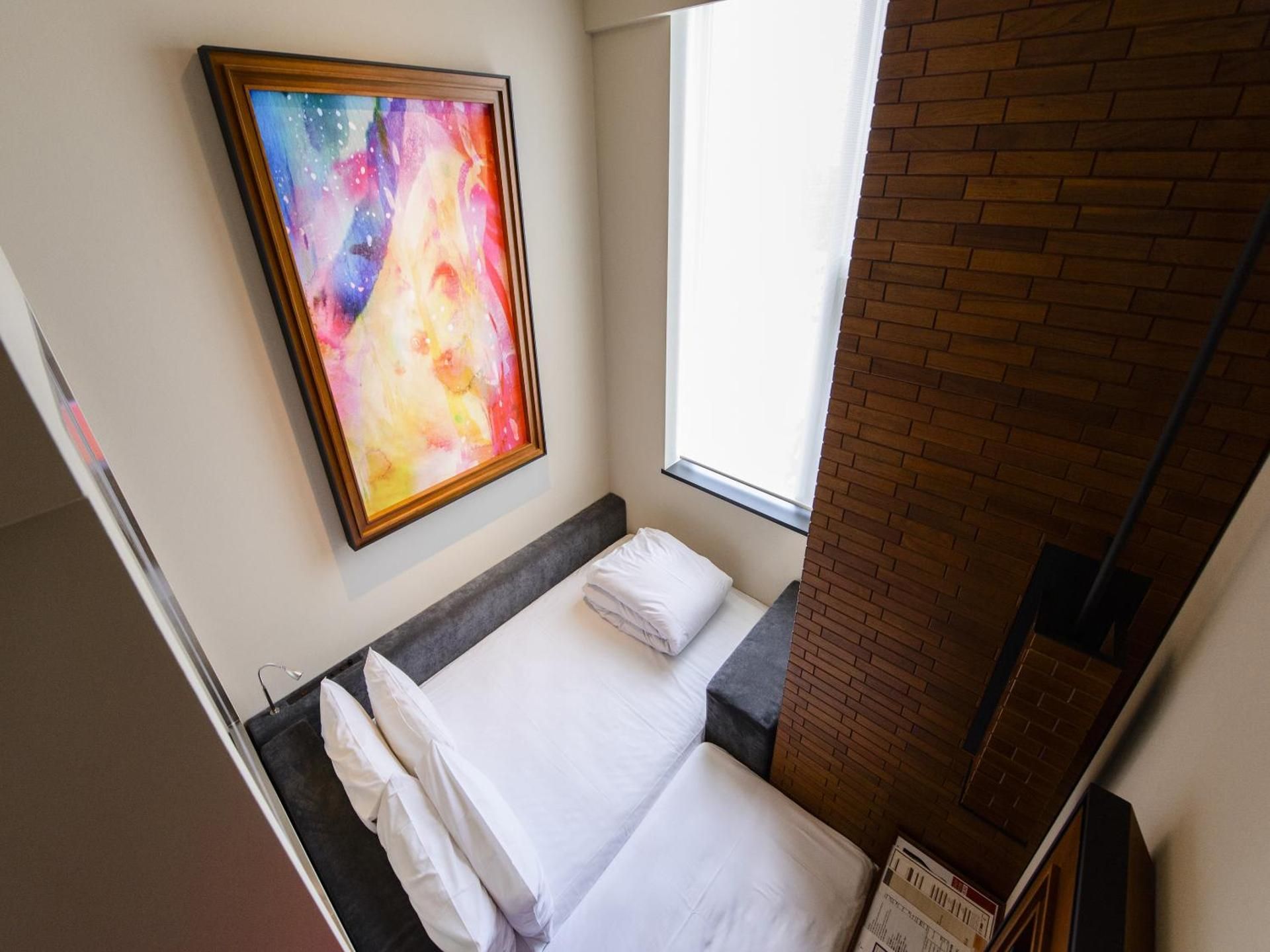 High Ceiling Economy Single Room