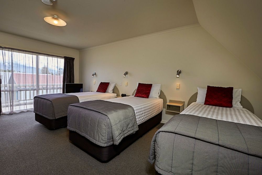 The White Morph - Heritage Collection Two Bedroom Family Apartment, located on Upper Floor, internal stairs to bedroom, Garden View 3