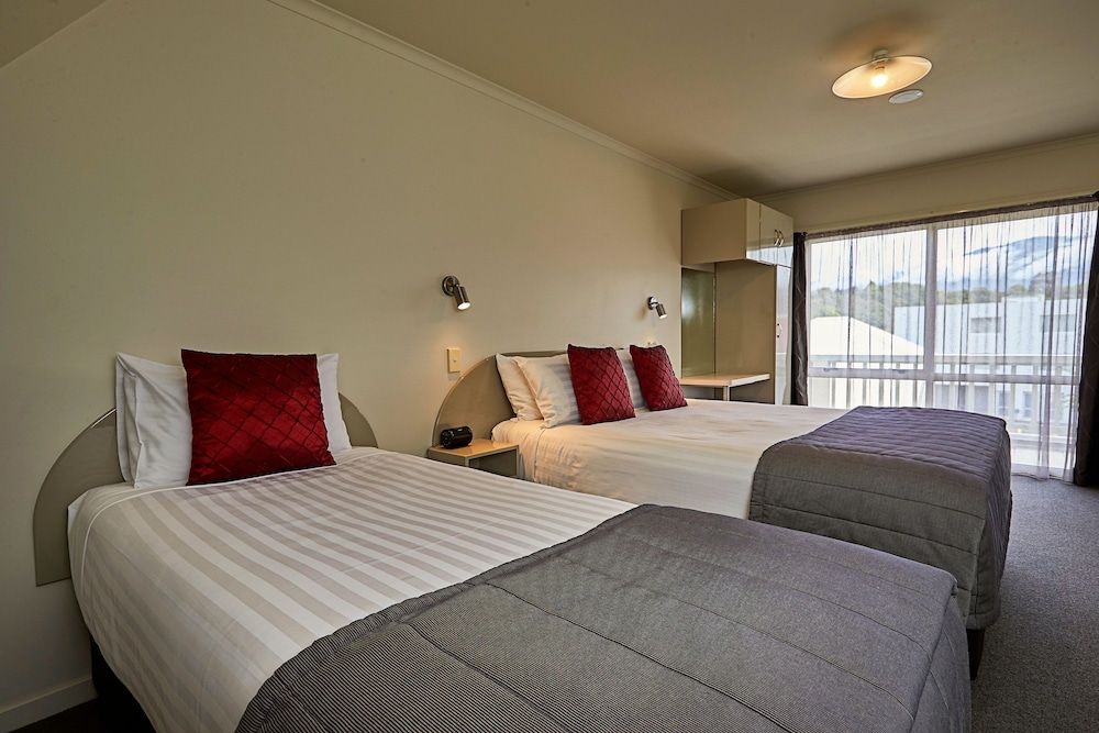 The White Morph - Heritage Collection Two Bedroom Family Apartment, located on Upper Floor, internal stairs to bedroom, Garden View 4