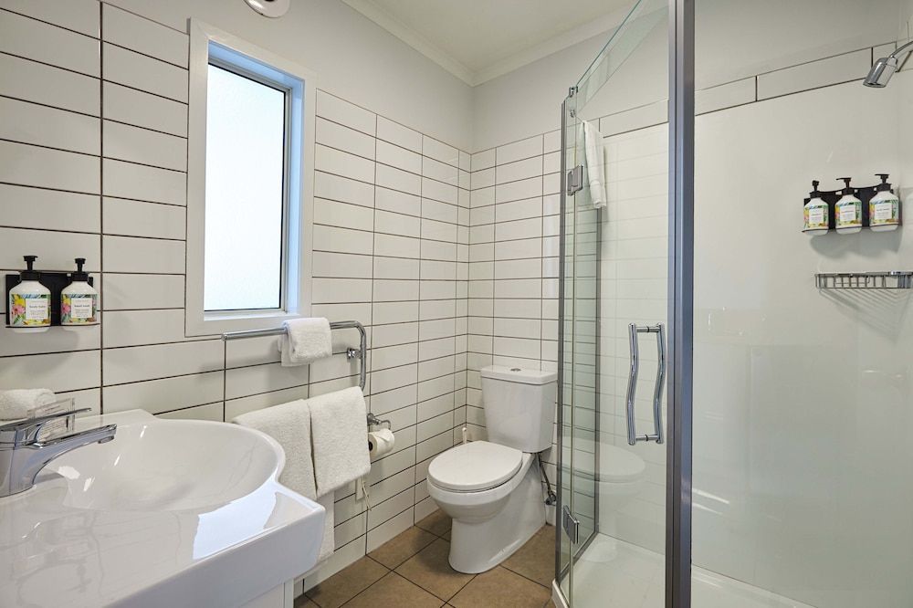 The White Morph - Heritage Collection Two Bedroom Family Apartment, located on Upper Floor, internal stairs to bedroom, Garden View 6