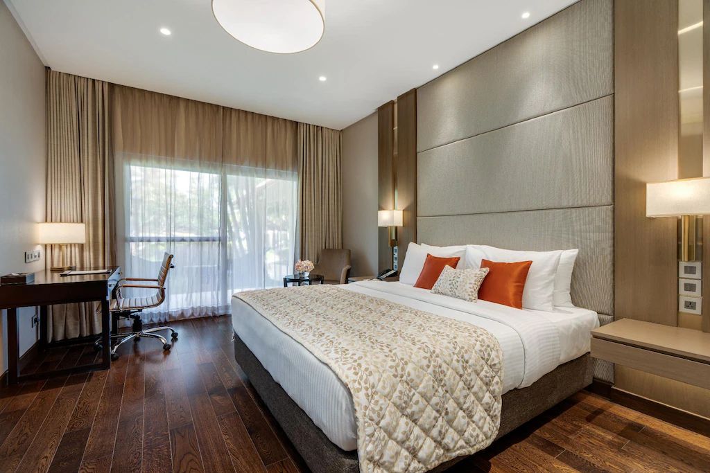 Deluxe King Room Pool View with Balcony