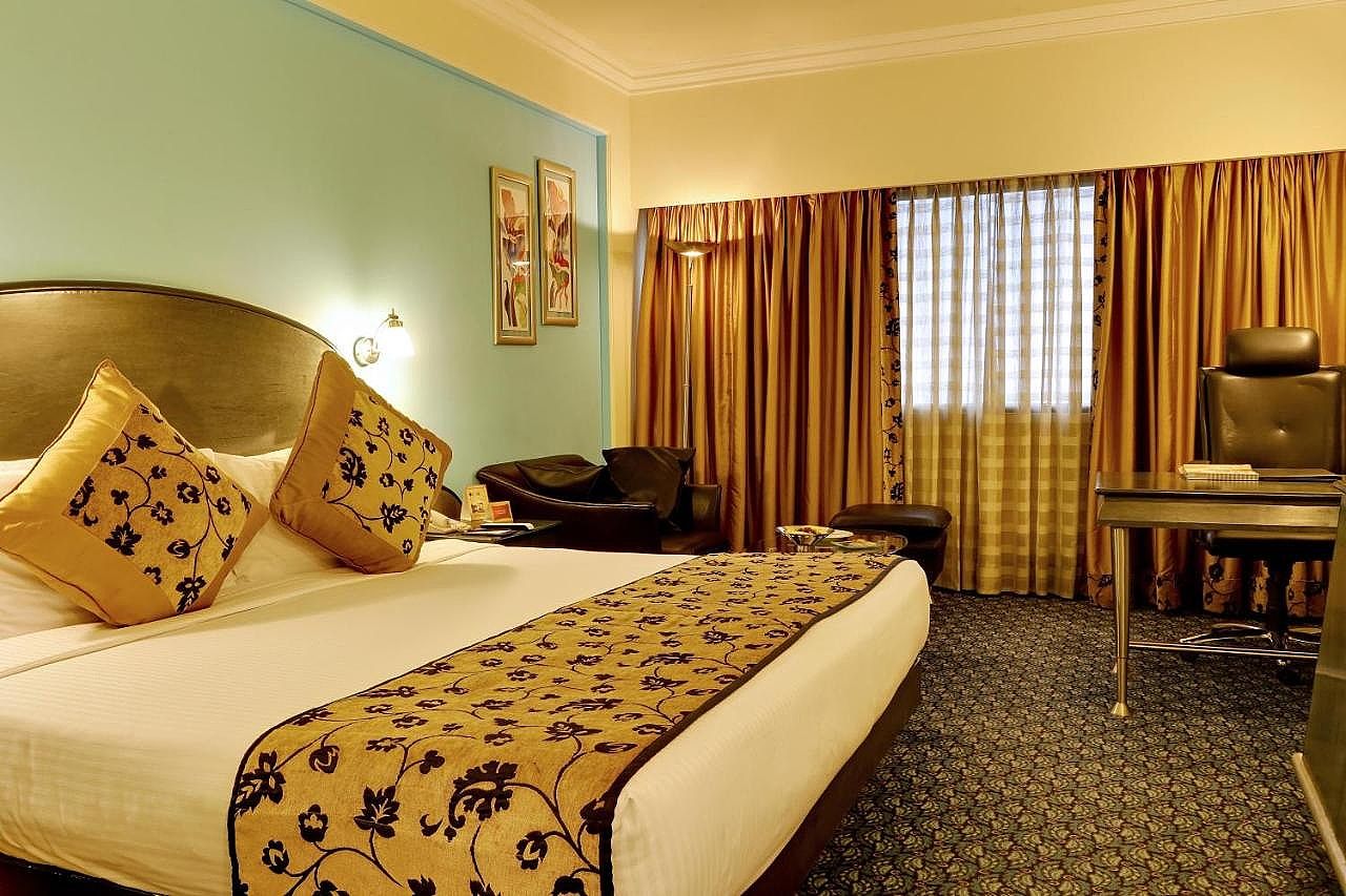 The Suryaa New Delhi Deluxe Room King or Twin 4