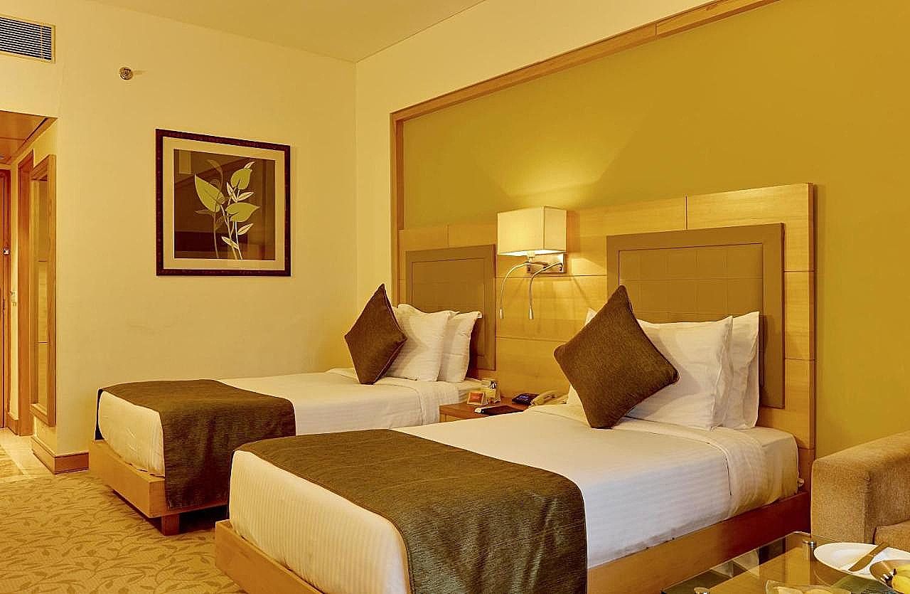 The Suryaa New Delhi Deluxe Room King or Twin 9