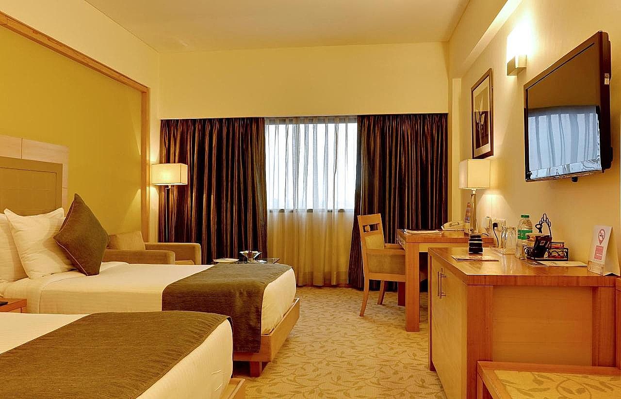The Suryaa New Delhi Deluxe Room King or Twin 3