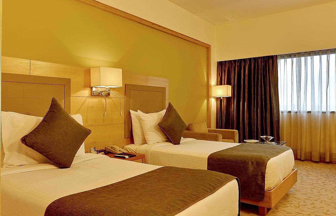 The Suryaa New Delhi Deluxe Room King or Twin 5