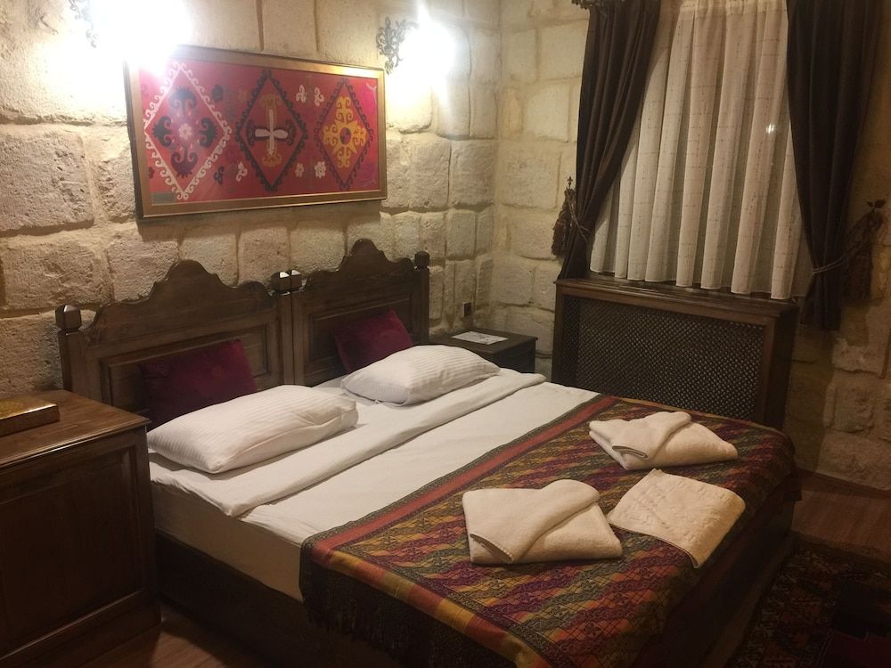 Urgup Inn Cave Hotel Family Triple Room, 1 Bedroom, Courtyard Area 3